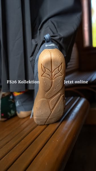 This ad features a close-up shot of a sneaker sole with a distinctive tread pattern that includes a fox design. The ad m