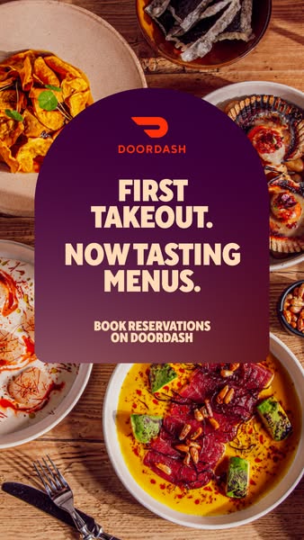 This ad promotes DoorDash's expansion into tasting menus and reservations. It features an eye-level shot of beautifu