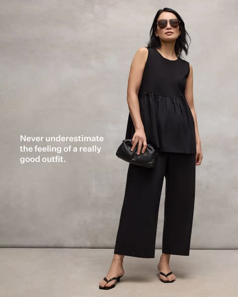 This image ad emphasizes the feeling of wearing a really good outfit, showcasing a woman dressed in black separates. The