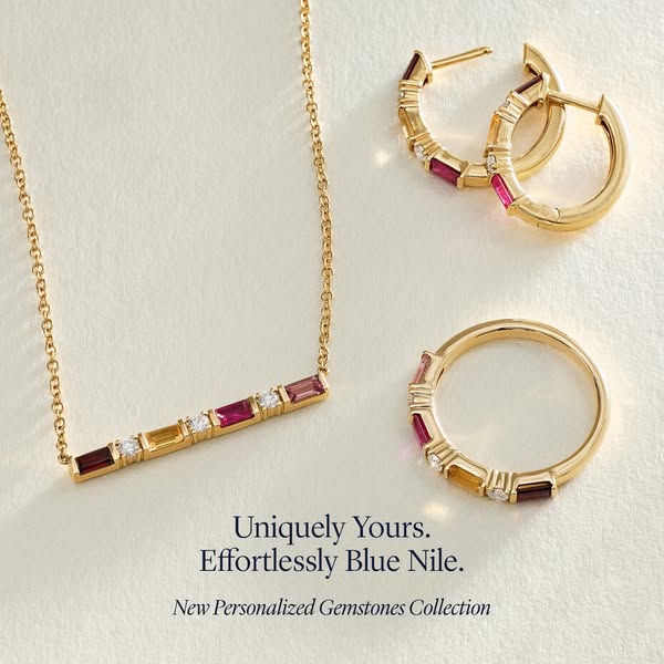 This ad showcases a necklace, ring, and pair of earrings from Blue Nile's new personalized gemstone collection.