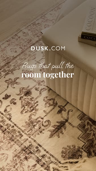 An overhead shot features the edge of a patterned rug near an ottoman with a book on top of it. The ad focuses on the lo