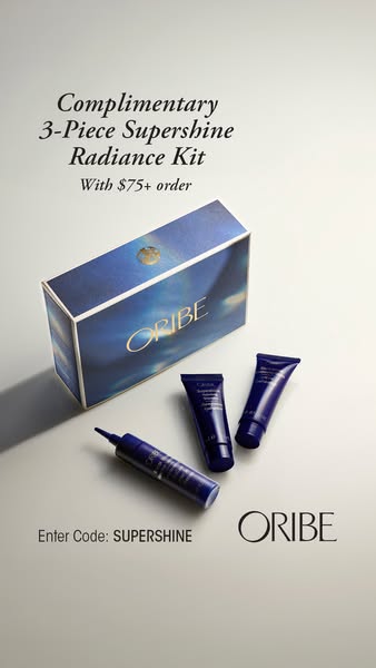 This ad promotes Oribe's Supershine Radiance Kit as a complimentary gift with orders over $75. It features a close-u