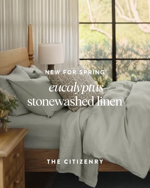 A hero shot features a bed with eucalyptus stonewashed linen bedding, highlighting the product's texture and color i