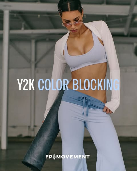 This ad for FP Movement showcases a coordinated outfit featuring color blocking in shades of light blue. The ad is desig