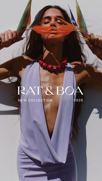 An image ad for the Rat & Boa new collection. The ad features a woman wearing a lilac dress, posing with two bird of