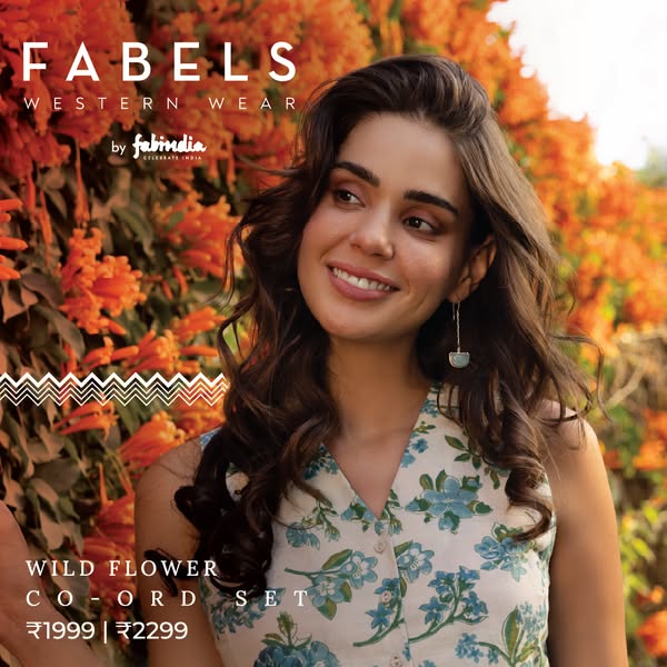 The ad features an image of a person wearing a floral co-ord set from the brand Fabels Western Wear by Fabindia. The ima