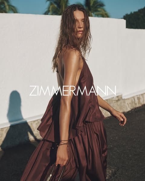 This ad for Zimmermann features a model wearing a Zimmerman dress, emphasizing the brand's high-end positioning and 
