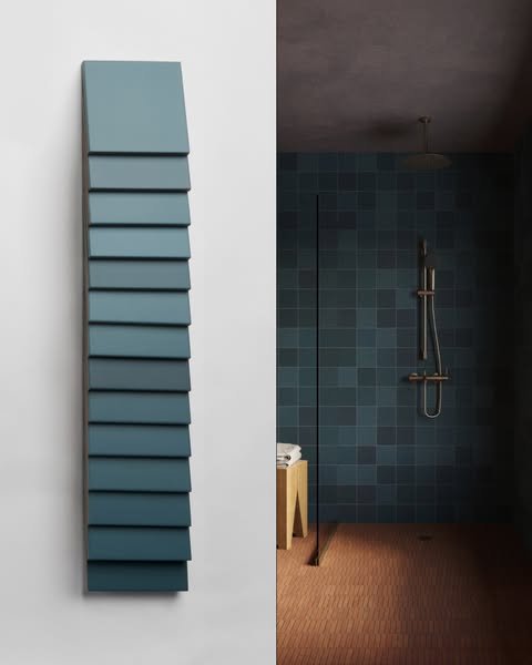 This ad showcases a range of blue-toned tiles, presenting them as a color palette and in a bathroom setting to inspire v