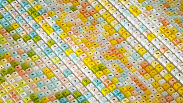 An abstract image ad featuring a pattern of colorful computer keys.