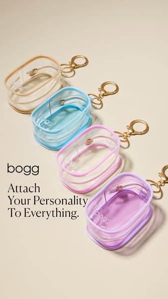The ad features a product showcase of Bogg Bags' clear pouch keychains in various colors. The slogan encourages cust