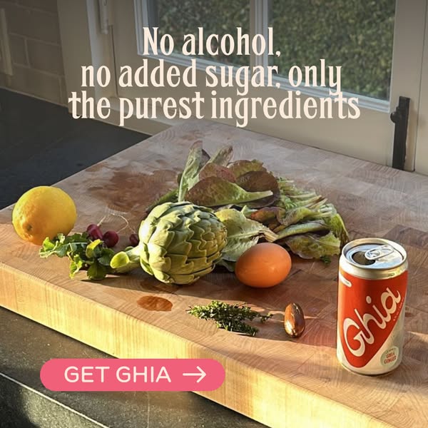 This ad for Ghia features a can of Ghia next to fresh ingredients on a wooden cutting board. The ad emphasizes the drink