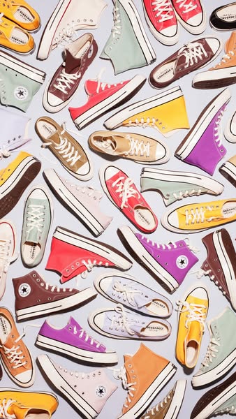 This ad showcases a variety of Converse shoes in an array of colors and styles. The ad features various high-top and low
