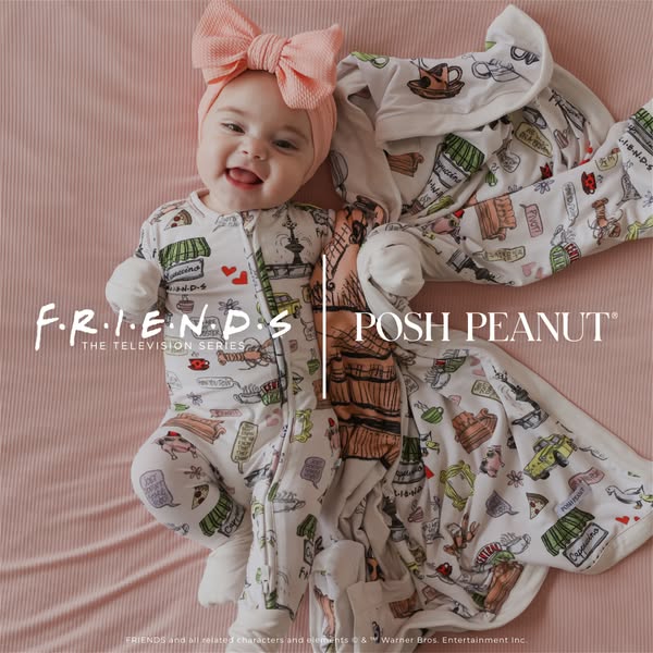 The ad showcases a baby wearing a 'Friends'-themed Posh Peanut romper and laying on a matching blanket. The over