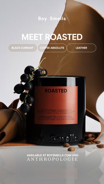 This ad showcases the Roasted candle from Boy Smells, highlighting its key scent notes and availability at boysmells.com