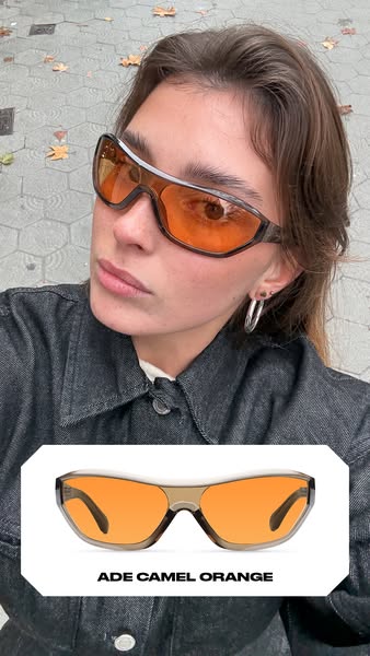 This image ad shows a person wearing a pair of camel orange sunglasses. Below the photo, the sunglasses are shown again,