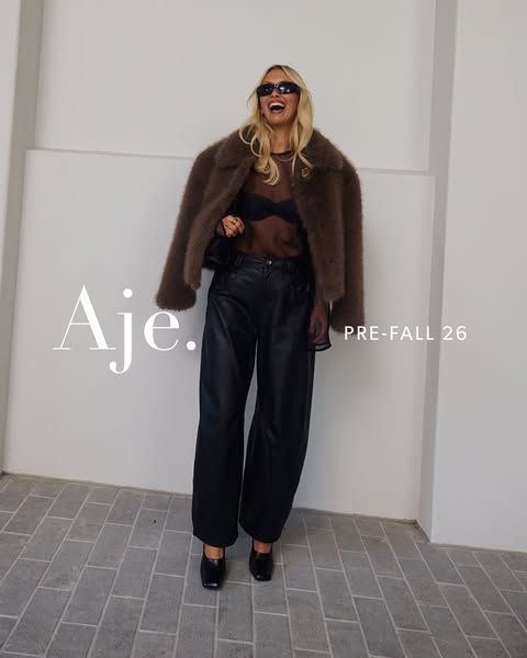 This ad showcases a model wearing items from Aje's Pre-Fall 2026 collection.