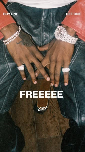 This ad features a close-up shot of a model's hands adorned with diamond jewelry, highlighting a buy-one-get-one-fre