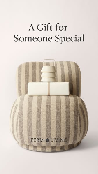 This ad features a lamp and a gift box on a striped chair to suggest a gift idea for someone special.