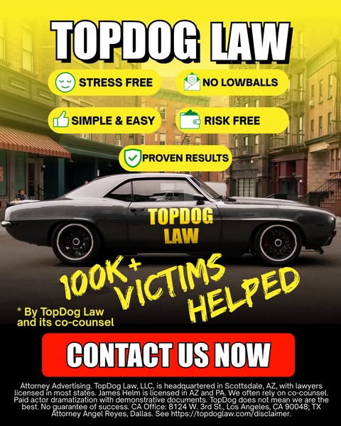 This ad for TopDog Law features a sleek, dark-colored muscle car parked in front of an urban streetscape. The ad promote