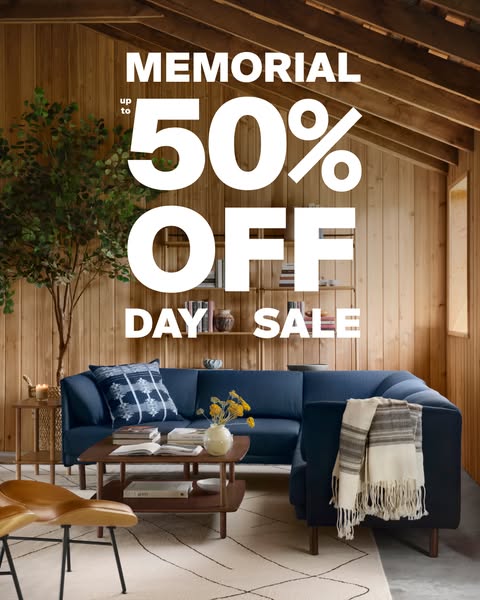 This image ad advertises a Memorial Day Sale with up to 50% off. The ad features a living room setup including a couch,