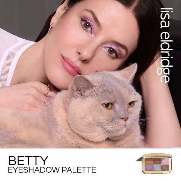 This image ad features Lisa Eldridge with her cat and the Lisa Eldridge Beauty Betty Eyeshadow Palette. The ad focuses o