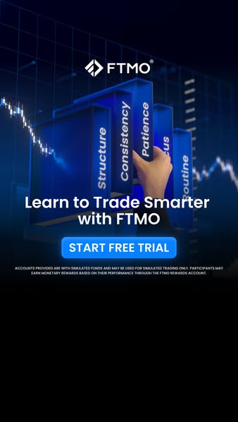 This ad promotes FTMO, a platform that helps people learn to trade smarter. The ad features a hand placing blocks labele