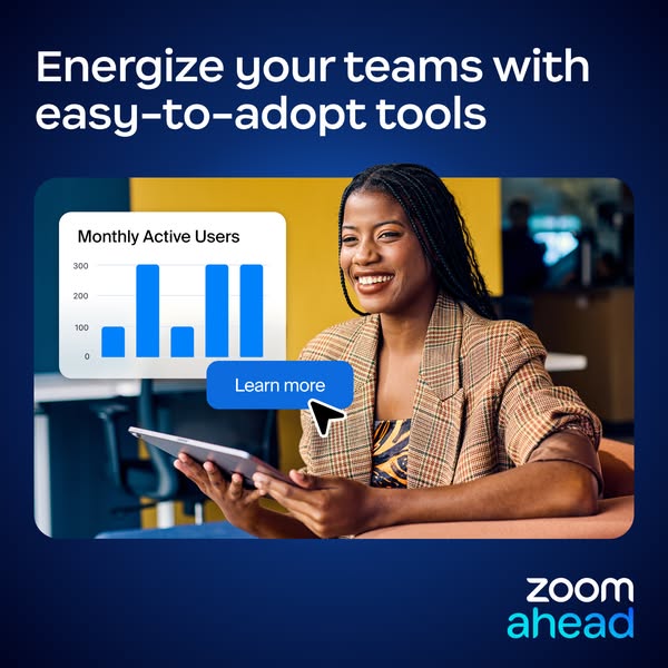 The image ad promotes Zoom Ahead and shows a graph displaying monthly active users on a tablet being held by a smiling w