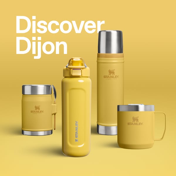 A minimalist product image showcasing Stanley brand insulated drinkware in the Dijon colorway. It emphasizes Stanley'