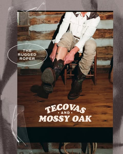 An advertisement for Tecovas and Mossy Oak boots. The ad shows a person wearing the boots indoors, seated on a wooden ch