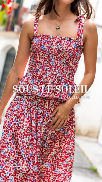 The ad is an eye-level, full-body shot of a person wearing a floral two-piece outfit from the brand Sous Le Soleil. The 