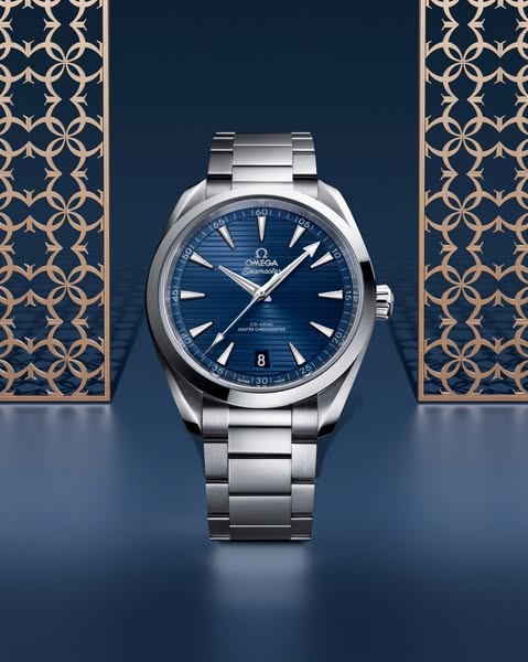 An ad featuring the OMEGA Seamaster Aqua Terra watch, highlighted for its luxury design.