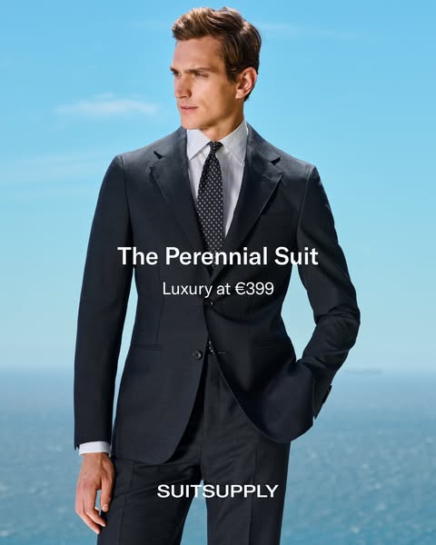 An ad for SuitSupply that highlights their 'The Perennial Suit' at a price of €399. The ad features a man in the