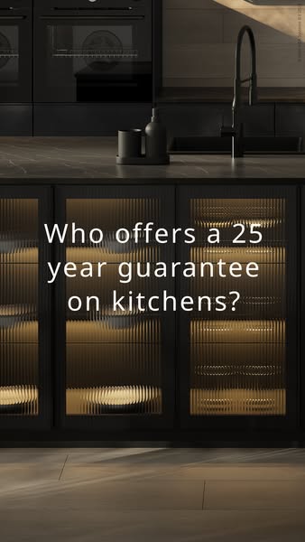 This ad features a modern, all-black kitchen and poses a question about the brand's 25-year guarantee.