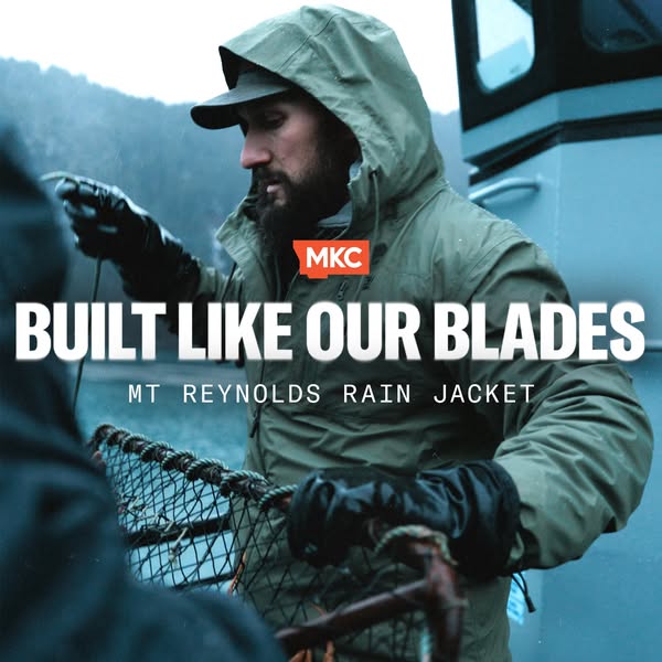 This ad features a rugged-looking man on a boat, wearing a rain jacket. The visuals highlight the jacket's durabilit