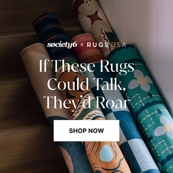 This image ad showcases a variety of colorful rugs that are rolled up, displayed as though they're on stairs, and re