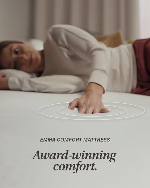 This ad showcases the Emma Comfort Mattress, emphasizing its award-winning comfort through a visual demonstration of its