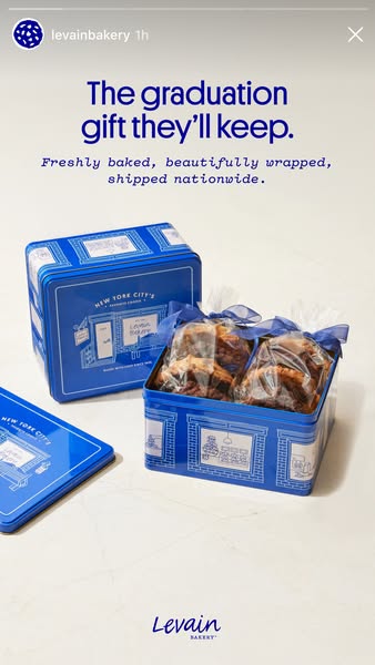 This image ad by Levain Bakery promotes their cookies as an ideal graduation gift. The ad emphasizes the cookies are fre
