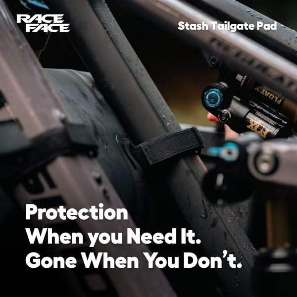 This ad shows the Race Face Stash Tailgate Pad attached to a pickup truck tailgate with the text overlay, "Protecti