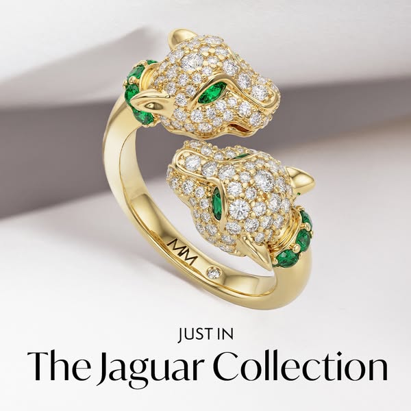 The ad showcases a gold ring from "The Jaguar Collection". The ring is designed with two jaguar heads facing o