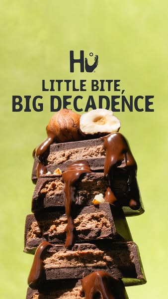 This ad features a tower of Hu chocolate bars dripping with more chocolate and topped with a hazelnut, emphasizing the d