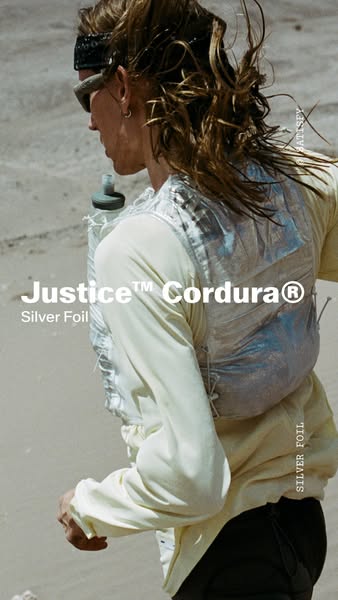 This image ad showcases a running vest with the text overlays "Justice™ Cordura®" and "Silver Foil".