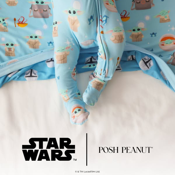 This ad features a close-up shot of a baby wearing Star Wars themed pajamas. The 'Posh Peanut' brand is promoted