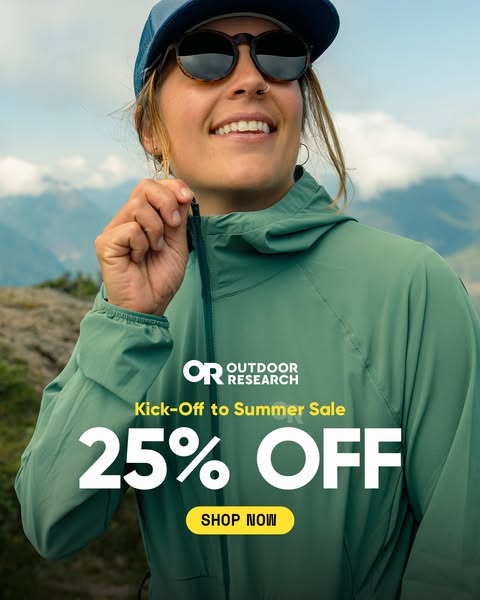 This ad for Outdoor Research features a smiling woman wearing a green hooded jacket. The ad promotes a 25% off "Kic