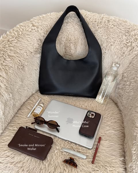 An image promoting Status Society bags and accessories. The image showcases a Status Society handbag with the brand'