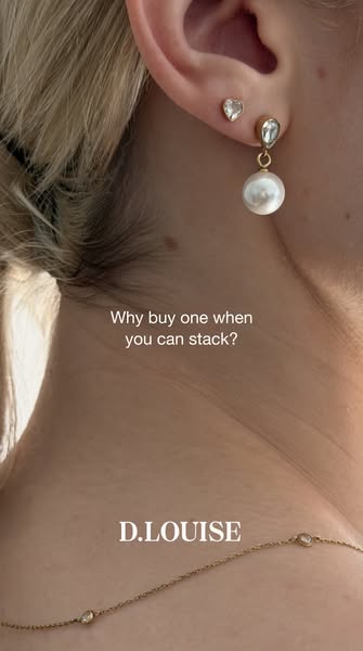 This image ad showcases the brand D.LOUISE with a close-up shot of their earrings. It directly addresses the viewer with