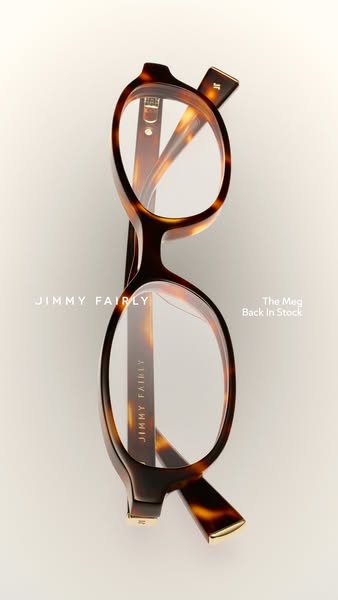 This ad features a pair of Jimmy Fairly glasses, highlighting the return of 'The Meg' model in stock. The image 