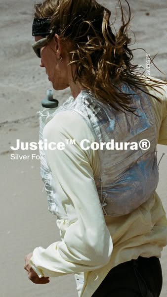 An image ad showcasing the Justice™ Cordura® Silver Foil product, worn by a runner on a beach.