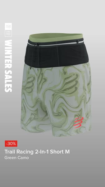 This ad showcases the Trail Racing 2-In-1 Short M in Green Camo, highlighting a 30% discount during the Winter Sales.