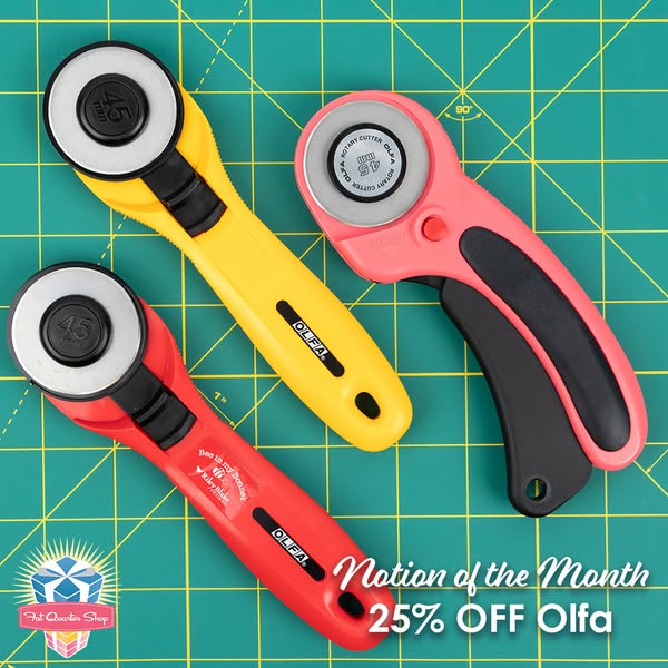This image ad for Fat Quarter Shop showcases Olfa rotary cutters in red, yellow, and pink on a green gridded cutting mat