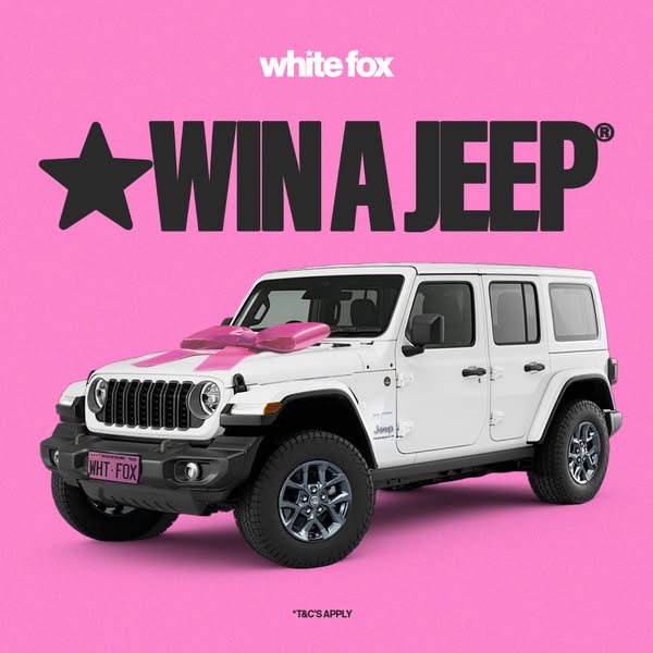 This image ad announces a giveaway for a Jeep. The ad features a white Jeep with a pink bow on the hood against a pink b